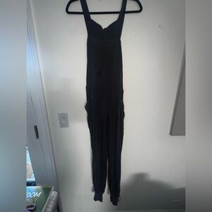 Destroyed FP Movement by Free People Dark Jumpsuit